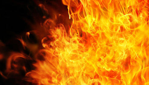 Close-up of fire against black background