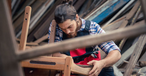 Man working on wood