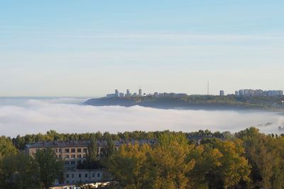 Morning fog over the city and the river. high quality photo