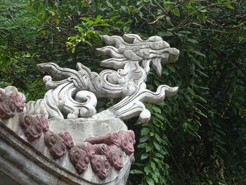 Close-up of angel statue in park