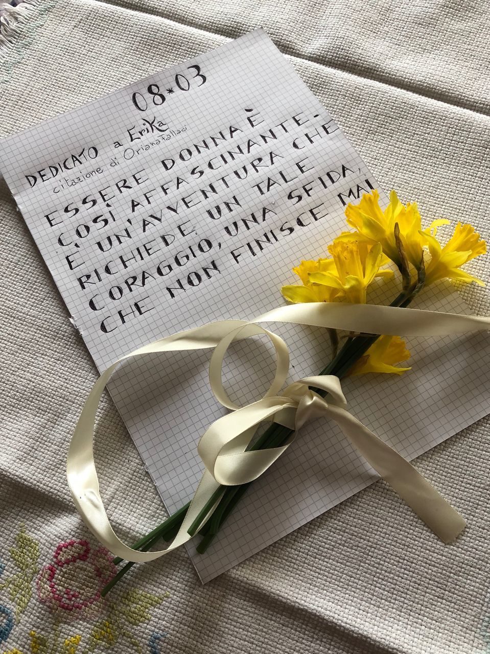 CLOSE-UP OF FLOWER ON TABLE