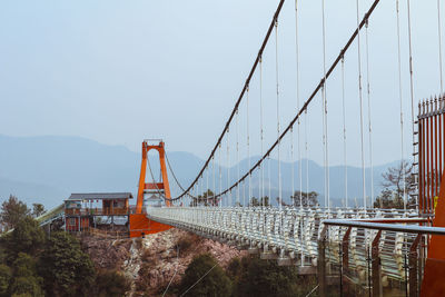 View of suspension bridge against sky