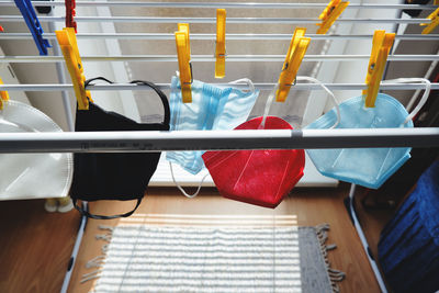 Close-up of multi colored clothes hanging on rack