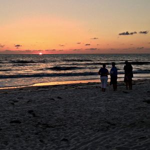 Scenic view of sea at sunset