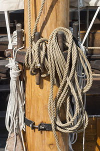 Close-up of rope tied to bollard