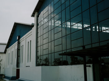 Low angle view of modern building against clear sky