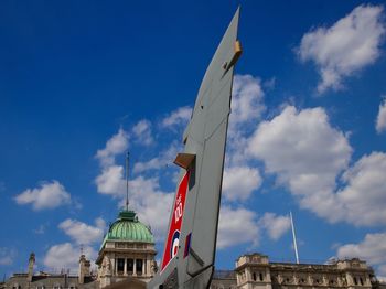 Low angle view of building against blue sky