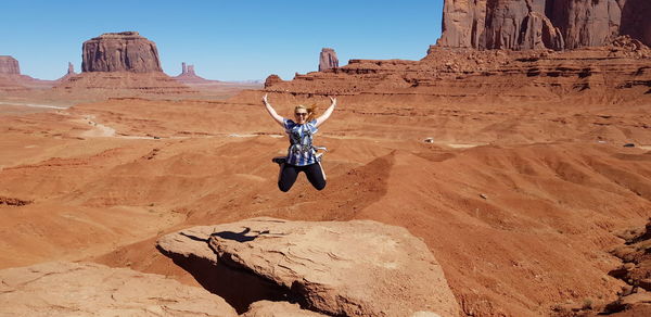 Full length of person on rock