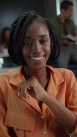 Portrait of smiling young woman in traditional clothing