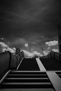 Low angle view of staircase against buildings in city