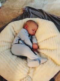 Cute baby sleeping in bed