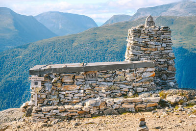 Stone wall with mountain in background