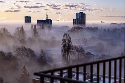 Buildings in city against sky