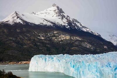Scenic view of snowcapped mountains during winter