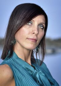 Close-up portrait of beautiful woman standing outdoors