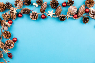 High angle view of candies against blue background