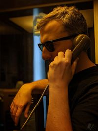 Portrait of young man wearing sunglasses