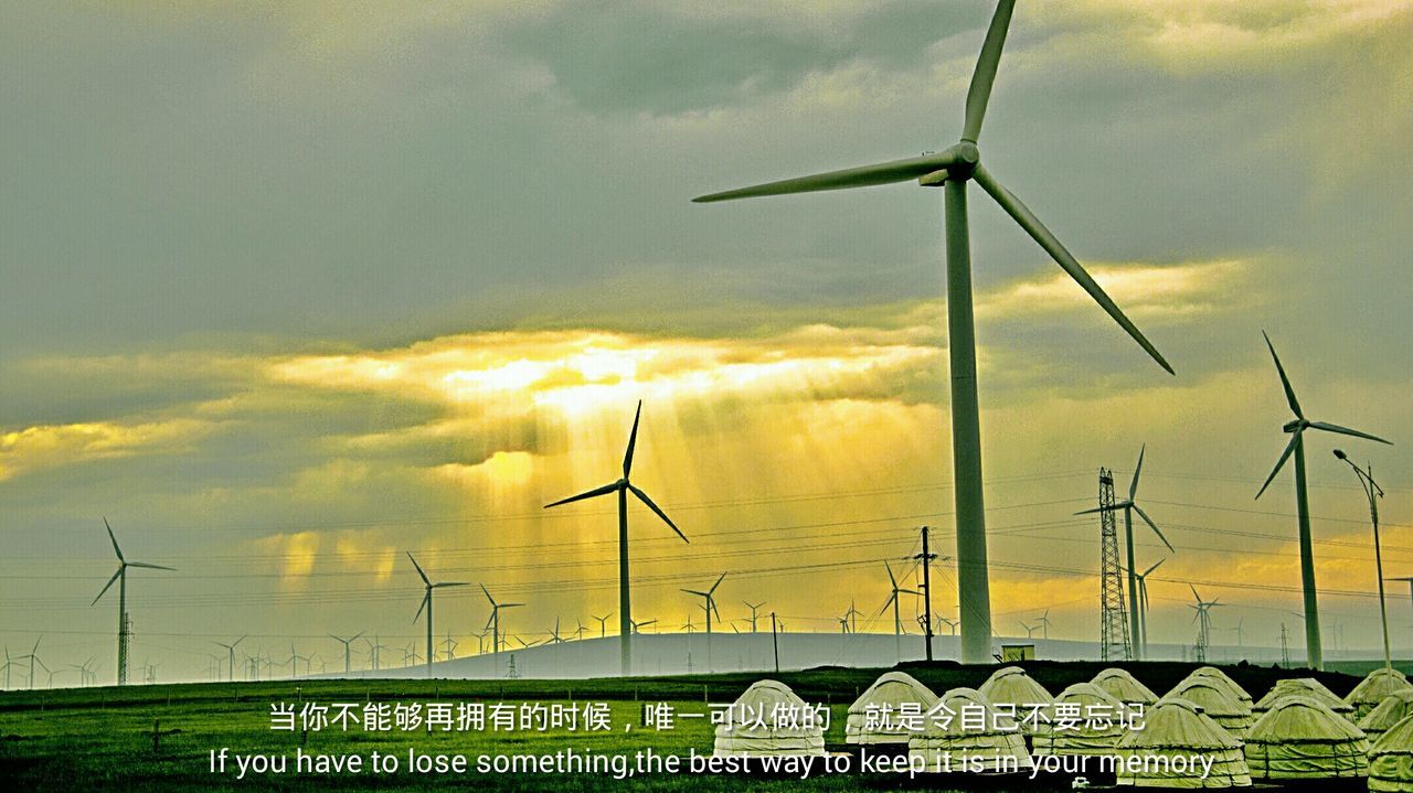 sky, field, alternative energy, wind power, landscape, cloud - sky, environmental conservation, wind turbine, renewable energy, windmill, rural scene, fuel and power generation, communication, cloudy, yellow, grass, nature, green color, outdoors, day