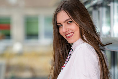 Portrait of a smiling young woman