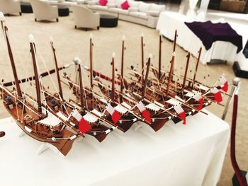 High angle view of model boats on table