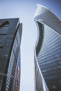 Low angle view of modern buildings against sky