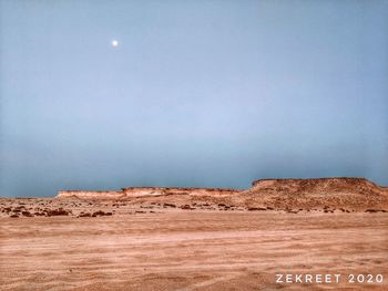 Scenic view of desert against sky