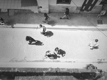 Woman standing by railing