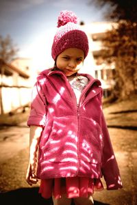 Boy wearing hat against sky