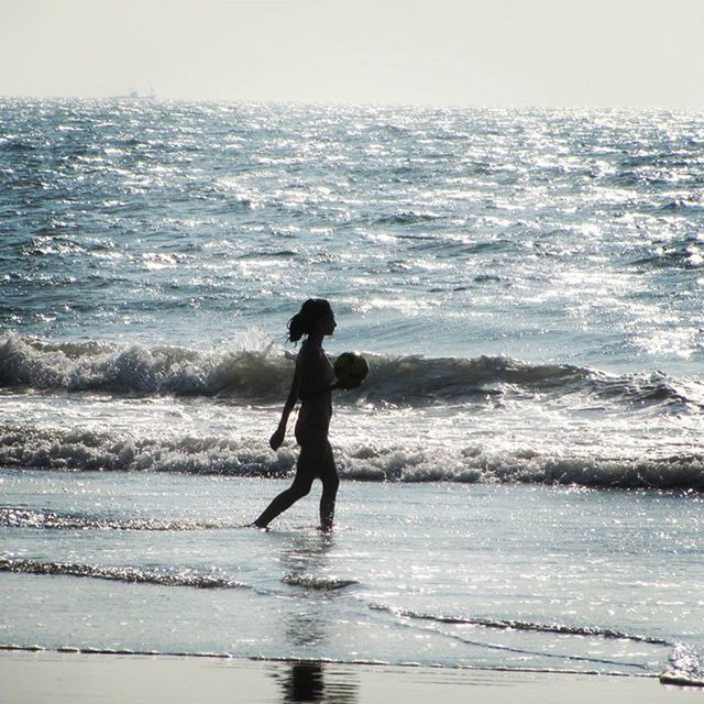 sea, water, beach, full length, shore, horizon over water, leisure activity, lifestyles, wave, sand, vacations, surf, childhood, enjoyment, boys, standing, men, nature