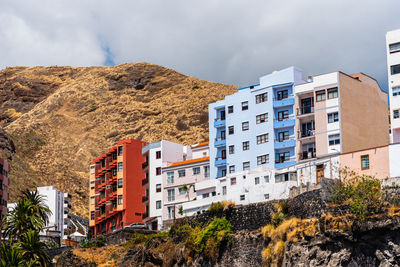 Colorful houses over the harbour in santa cruz de la palma, canary islands, spain