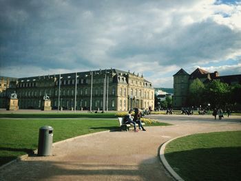 View of buildings against cloudy sky