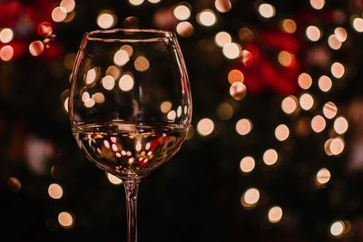 Close-up of illuminated christmas lights on table