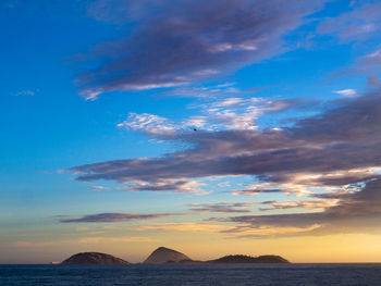 Scenic view of sea against sky at sunset