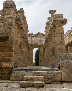 Old ruins of temple against sky