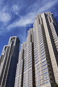 Low angle view of modern buildings against sky