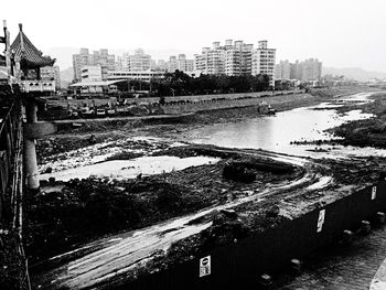 View of river with buildings in background