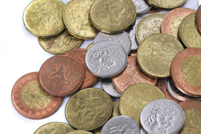 High angle view of coins on table