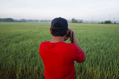 Full length of man in field