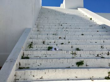 Close-up of steps against sky