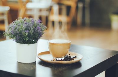 Close-up of coffee served on table