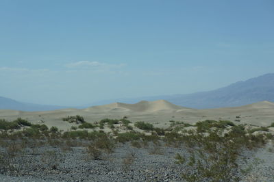 Scenic view of desert against sky