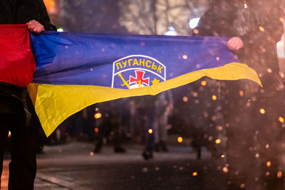 Flag of ukraine, luhansk or lugansk and battle flag upa near the border with russia, donbas region