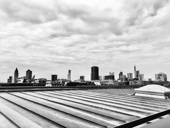 Modern buildings in city against sky