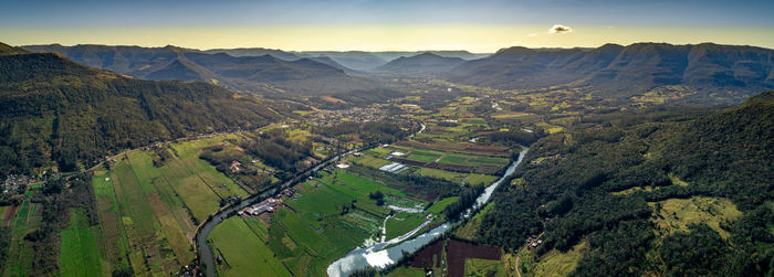 High angle view of farms against sky