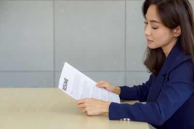 Woman working on paper