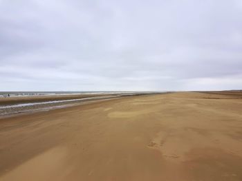 Scenic view of desert against sky