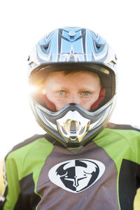 Portrait of boy wearing motorcycle helmet
