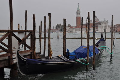 View across lagoon from st mark's square venice italy, gondolas of renaissance buildings  winter day