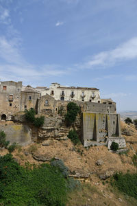 A narrow street among the old houses of irsina in basilicata, region in southern italy.