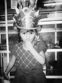 Portrait of boy standing outdoors